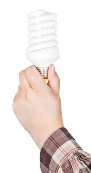 Hand hält Kompaktleuchtstofflampe — Stockfoto