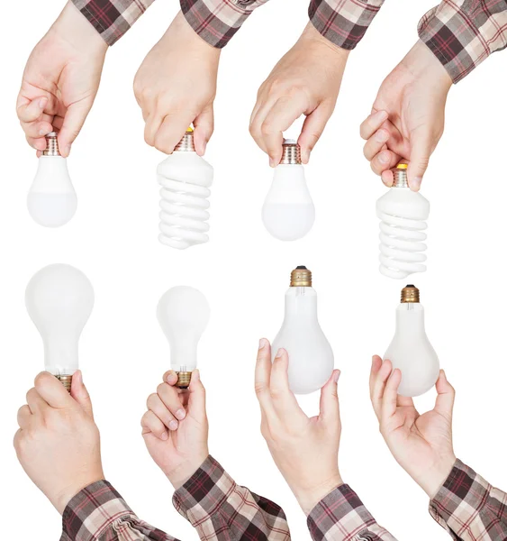 Set of hands hold various lamps isolated — Stock Photo, Image