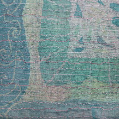 yeşil ipek kumaş ve arka plan üzerinde batik sıktı