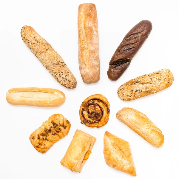 Various freshly baked pastries in sun shape — Stock Photo, Image