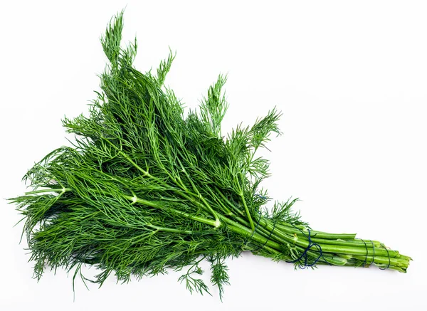 Куча свежей зеленой травы укропа на белом — стоковое фото