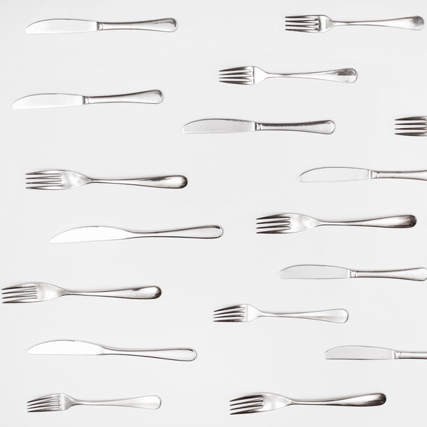 above view of many table knives and forks