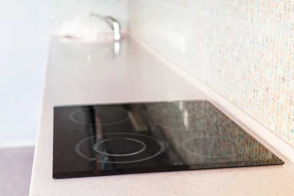 New tabletop with built-in cooking panel and sink — Stock Image New tabletop with built-in cooking panel and sink Stock Image
