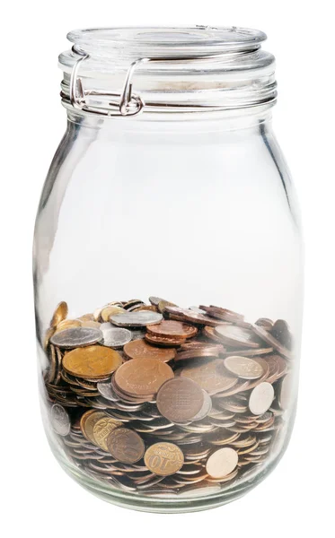 Closed glass jar with saved coins isolated — Stock Photo, Image