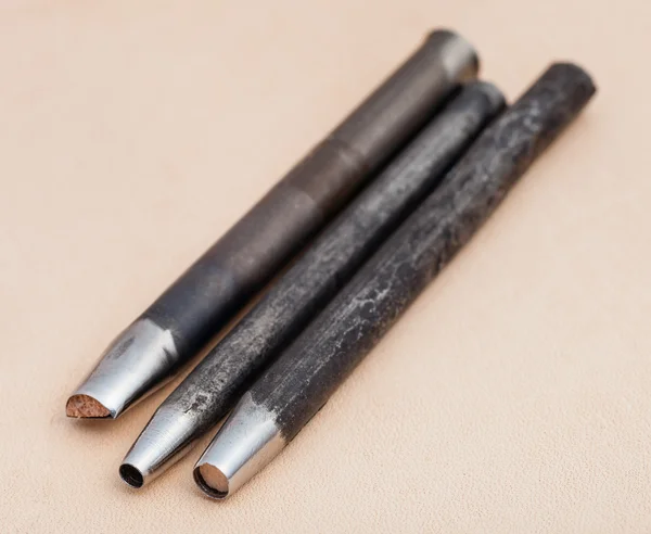 Perforating Leather Hole Punches on leather — Stock Photo, Image