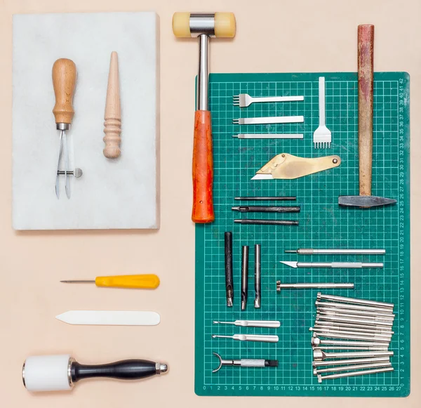 Top view of various tools for leathercrafting — Stock Photo, Image