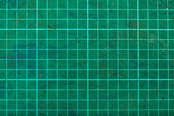 Green self-healing cutting mat close up — Stock Photo, Image