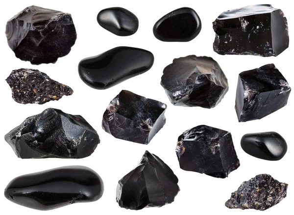 Коллекция из образцов черного обсидиана — стоковое фото