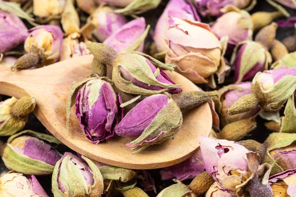 Old Dried Rosebuds Close Wood Spoon Pile Dried Flowers — Stock Photo, Image