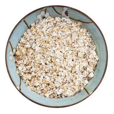 Yuvarlak kasedeki 4 mısır gevreğinin beyaz arka planda izole edilmiş üst görüntüsü