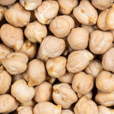 Kare yiyecek arka planı - Çiğ nohut tohumları kapatın