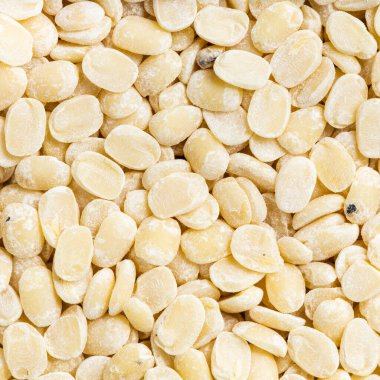 Kare yiyecek arka planı - ham urad dal (bölünmüş siyah gram) fasulyeleri kapat