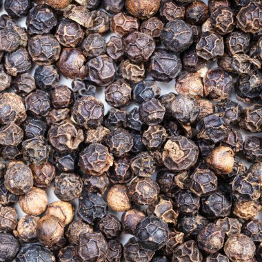 Kare yiyecek arka planı - Karabiber mısırları kapanıyor