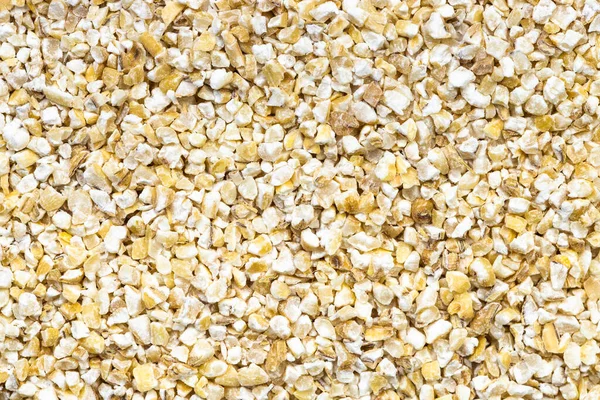 食品の背景 調理されていない砕いたポット大麦の穀物 — ストック写真