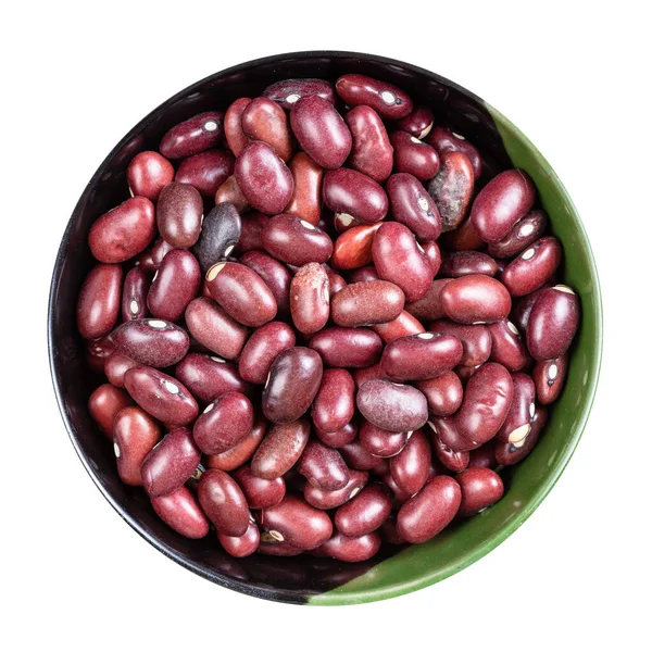 在白色背景上隔离的圆形碗中的生墨西哥红豆的顶部视图 — 图库照片