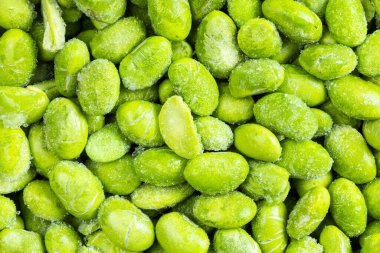 Gıda arka planı - birçok donmuş Edamame (olgunlaşmamış soya fasulyesi) yakın plan
