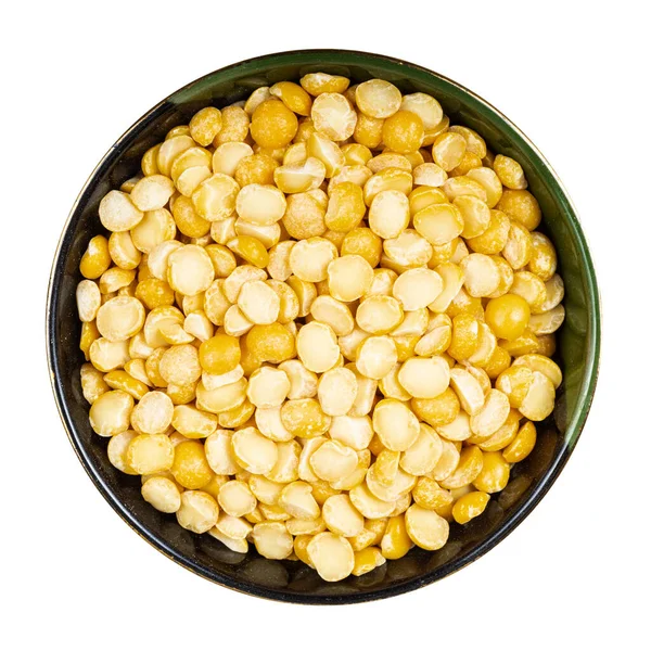 白い背景に隔離された丸いボウルに生乾燥した黄色のエンドウ豆のトップビュー — ストック写真