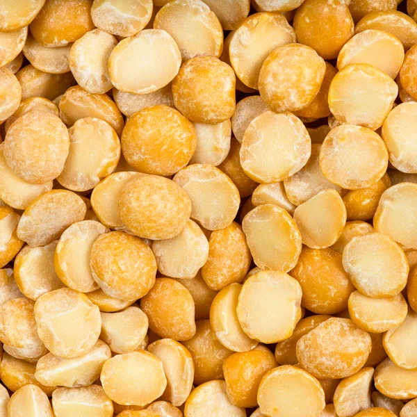 正方形の食品の背景 生乾燥した分割黄色のエンドウ豆を閉じる — ストック写真