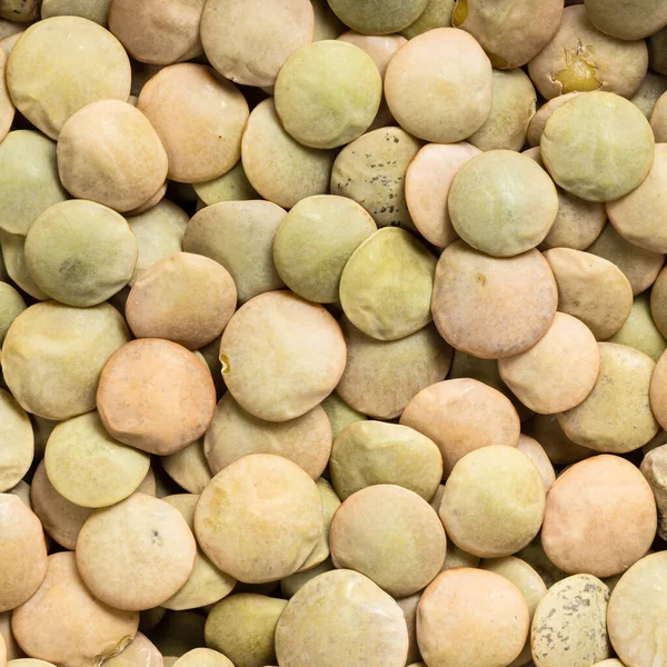 Fundo Comida Quadrada Lentilhas Verdes Grandes Inteiras Cruas Perto — Fotografia de Stock