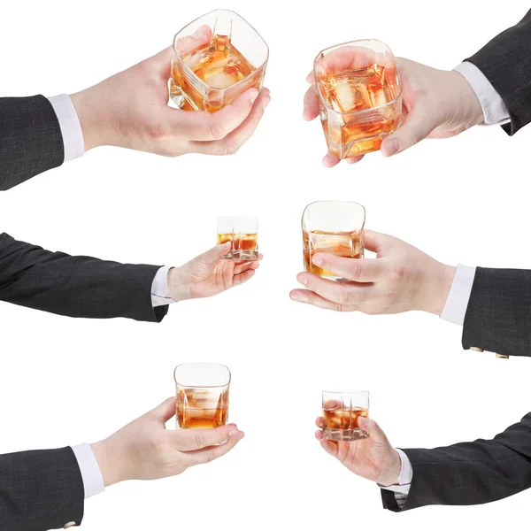 Whiskey-Glas in der Hand eines Geschäftsmannes — Stockfoto