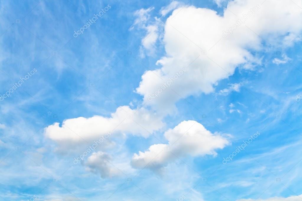 blue sky with white cumulus clouds in autumn