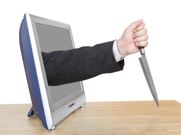 Knife in male hand leans out TV screen — Stock Photo, Image