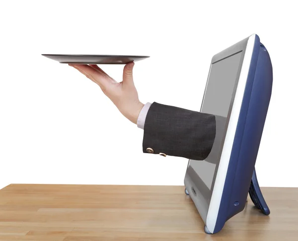 Palm with flat black plate leans out TV screen — Stock Photo, Image