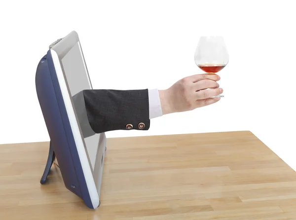 Toast with brandy glass in male hand leans out TV — Stock Photo, Image