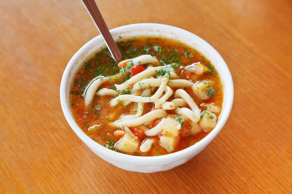 Laghman soup in white bowl — Stock Image Laghman soup in white bowl Royalty Free Stock Images