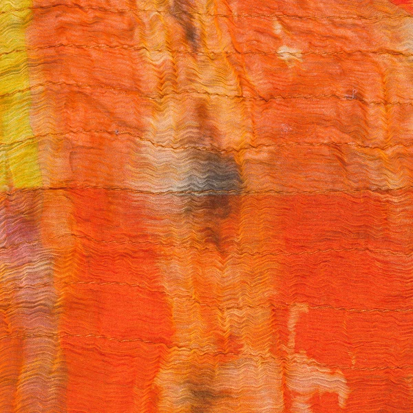 纹理的彩绘橙色真丝蜡染 — 图库照片