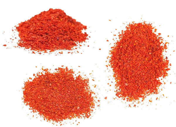 Trois piles de piment rouge moulu - paprika — Photo