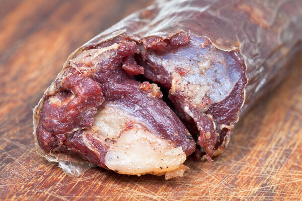 horse meat sausage kazy close up on chopping board