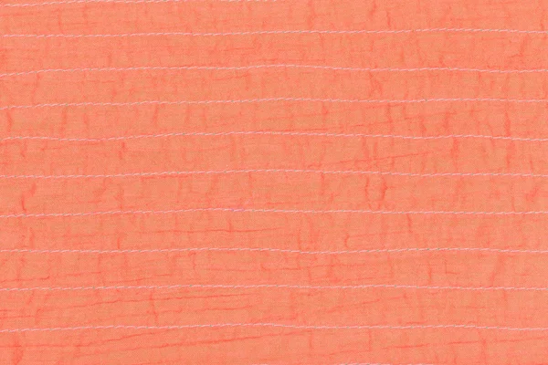 Texture textile couleur corail de soie cousue — Photo
