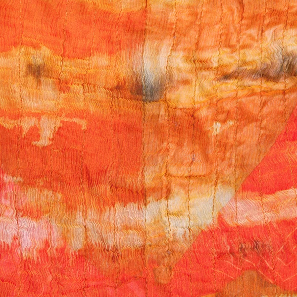 从抽象画橙色真丝蜡染的背景 — 图库照片