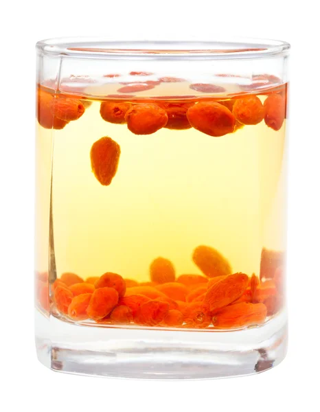 Side view glass with goji berries infusion isolated — Stock Photo, Image