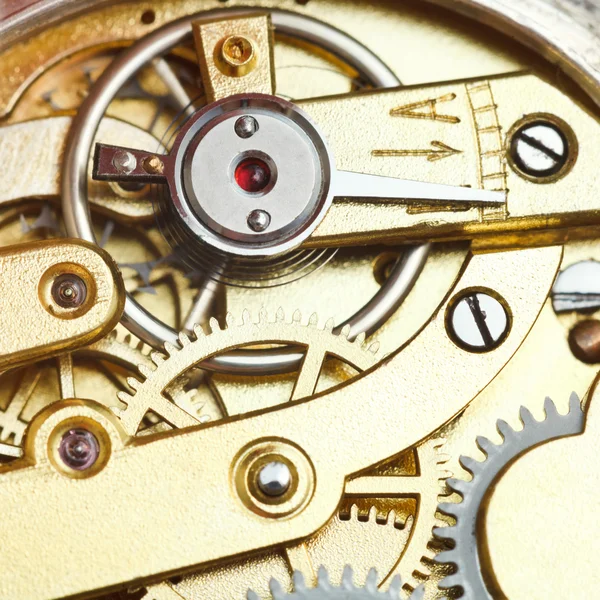 Brass mechanical clockwork of retro watch — Stock Photo, Image
