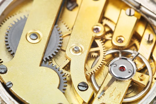 Round brass clockwork of vintage pocket watch — Stock Photo, Image