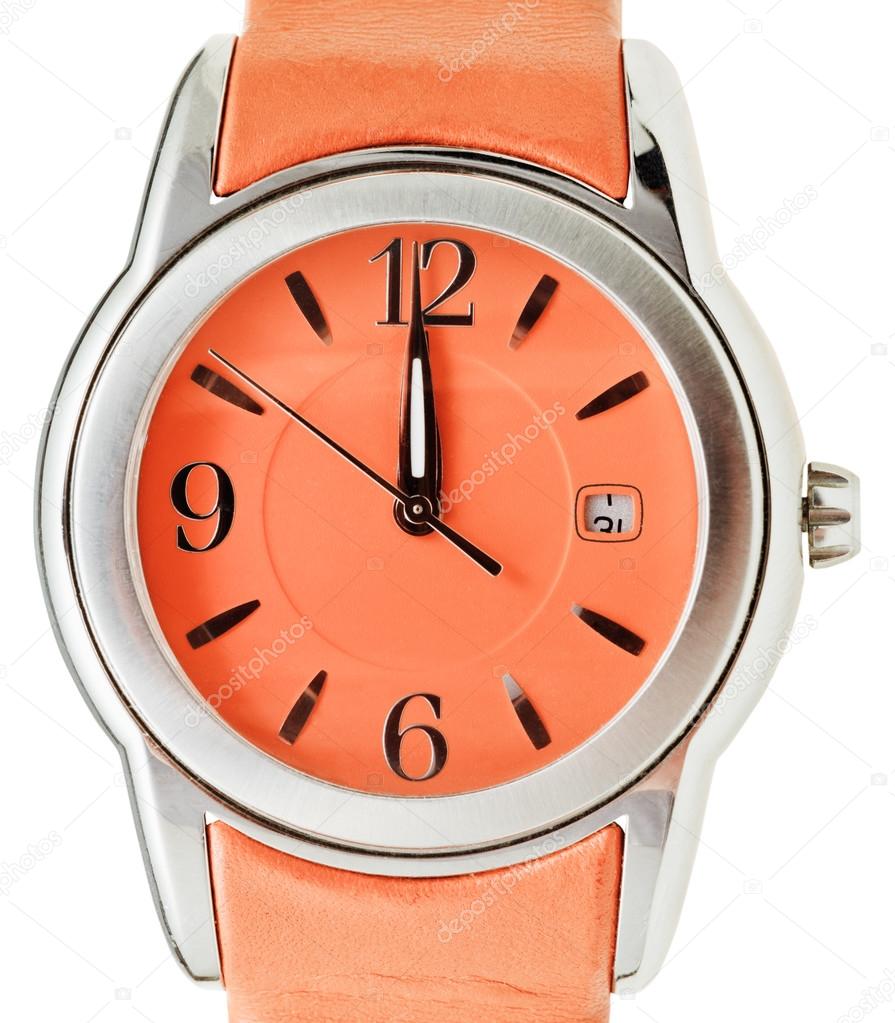 one minute to twelve o'clock on orange wristwatch