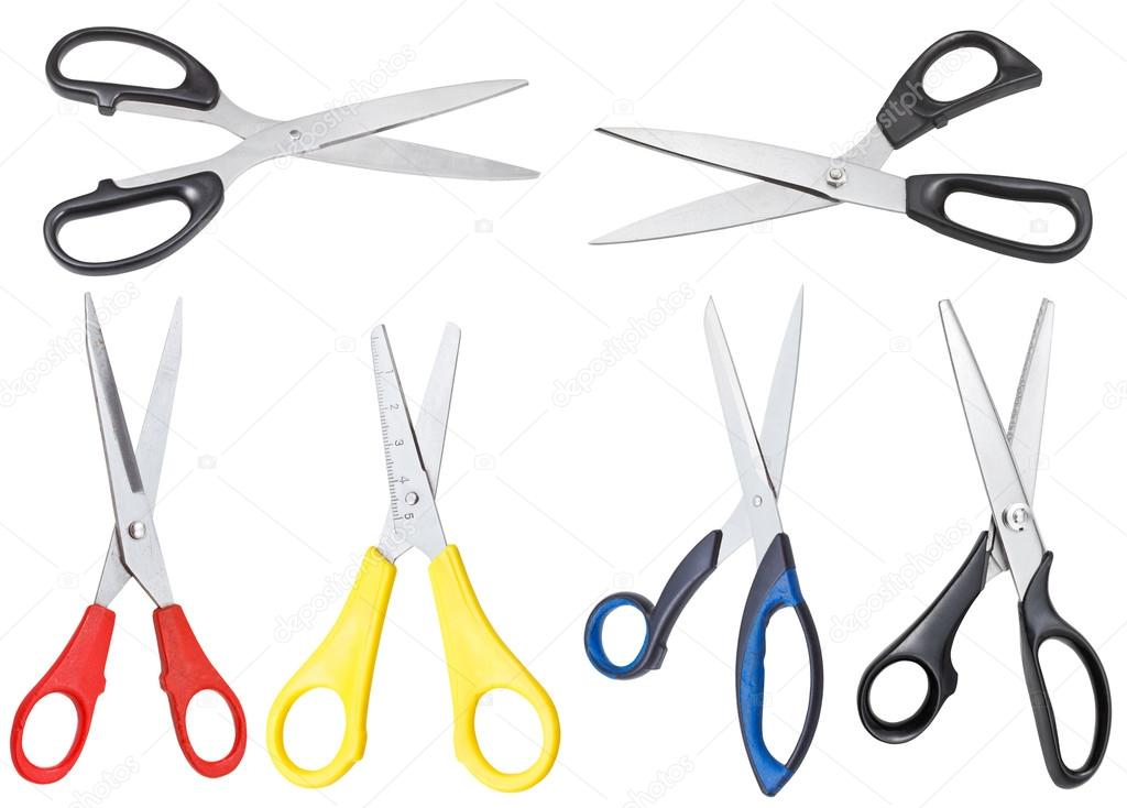 set of different open scissors isolated on white