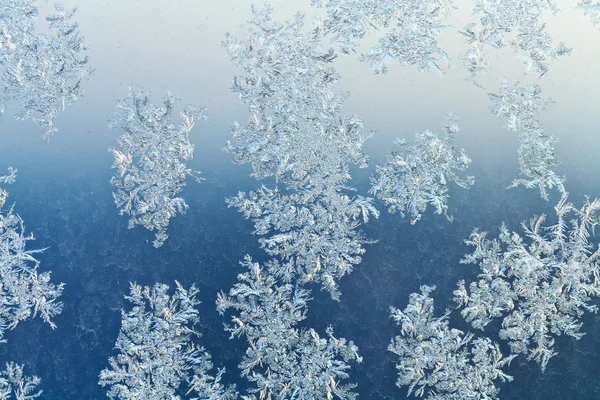 Frost on window glass close up in winter night — Stock Photo, Image