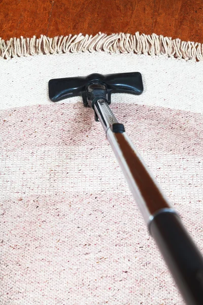 Carpet vacuuming with vacuum cleaner — Stock Photo, Image