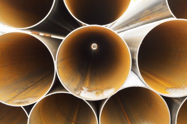 tops of rusty pipes close up clipart