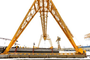 bridge crane over outdoor warehous clipart