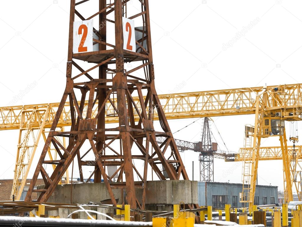 tower and bridge cranes in metal product warehouse