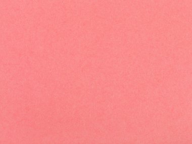 background from sheet of coral colored pastel paper clipart