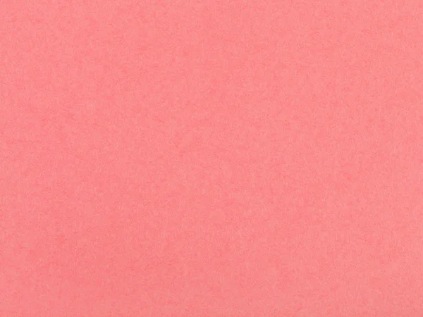 Background from sheet of coral colored pastel paper — Stock Photo, Image