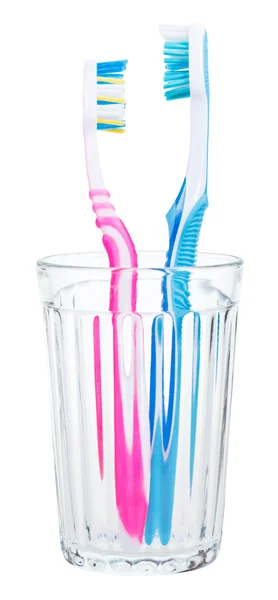 Couple of tooth brushes in glass — Stock Photo, Image