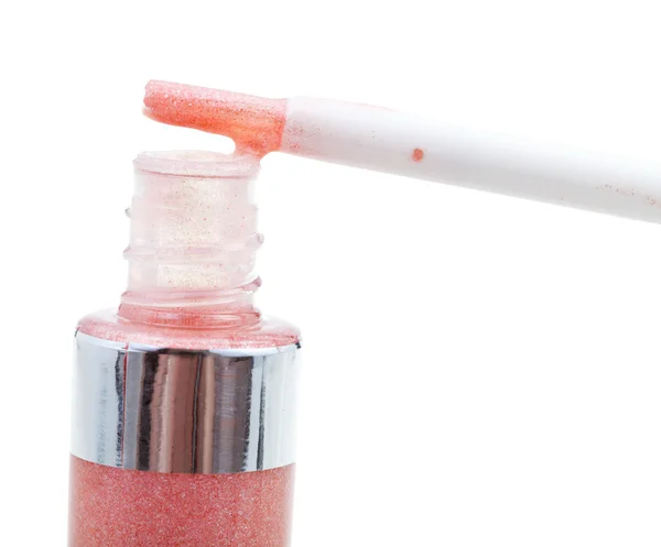 Tip of brush with pink lip gloss — Stock Photo, Image