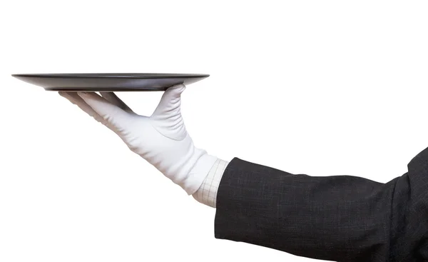 Seitenansicht der Hand in weißem Handschuh mit schwarzer Platte — Stockfoto