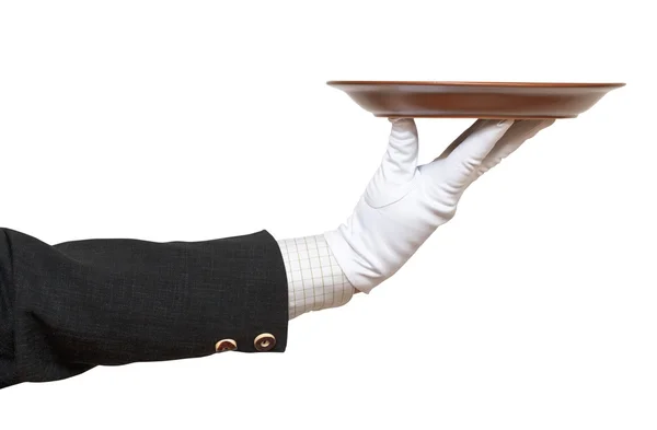Sidevisning av hånd i hvit hanske med brun plate – stockfoto